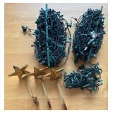 LR - Three Brass Star Stocking Holders and Christmas Lights
