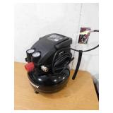 Husky 3 Gal. 120 PSI Portable Electric Oil-Free Light Duty Pancake Air Compressor with Fold Down Handle and 1-Quick Coupler