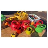 lot of musical, fruit and watering cans