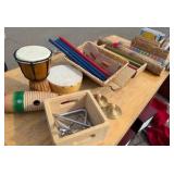 CDs rhythm, sticks instruments, triangles, drums symbols