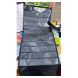 classroom information, posters, and slotted wall hangings