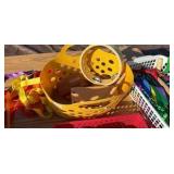 lot of musical, fruit and watering cans