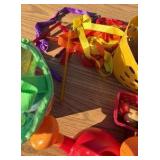 lot of musical, fruit and watering cans