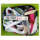 sewing supplies, zippers, twine, and ribbon