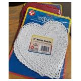 paints brushes, bells, heart doilies stencils