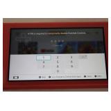 Nintendo Switch Console - Pink/Coral with Mario Kart 8 Deluxe Cartridge