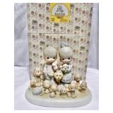 Precious Moments "The Good Lord Has Blessed Us Tenfold" limited edition figurine, item number 114022.