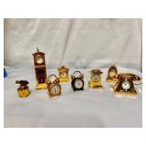 Collection of vintage gold-plated miniature clocks