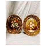Two vintage oval-framed oil paintings