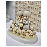 Precious Moments "The Good Lord Has Blessed Us Tenfold" limited edition figurine, item number 114022.