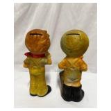 Pair of vintage ceramic piggy bank figurines, often referred to as "Hummel-like" or "Homco" style