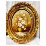 Two vintage oval-framed oil paintings