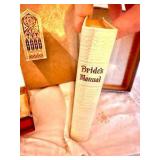 Vintage never used bridal book, coupled with vintage earrings