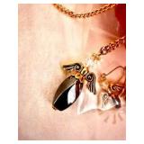 Angel themed jewelry set with earrings and necklace