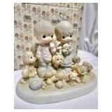 Precious Moments "The Good Lord Has Blessed Us Tenfold" limited edition figurine, item number 114022.
