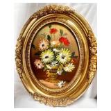 Two vintage oval-framed oil paintings