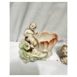 Two vintage bisque porcelain cherub or putti planters
