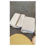 Vintage Table Linens & Textiles Lot – Quilted Placemats, Braid Trivets, & Embroidered Sunshine Towel