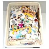 Postage Stamps in Plastic Bin - Mixed Countries