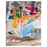Postage Stamps in Plastic Bin - Mixed Countries