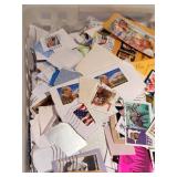 Postage Stamps in Plastic Bin - Mixed Countries