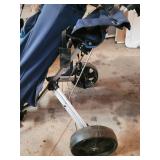 BagBoy Pro X7 Tour Collection Push Cart with Blue Cart Bag and Irons