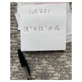 Black Metal Magazine Rack with Rocking Base and Wire Shelf