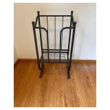 Black Metal Magazine Rack with Rocking Base and Wire Shelf