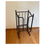 Black Metal Magazine Rack with Rocking Base and Wire Shelf