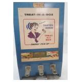 Vintage "Treat-In-A-Box" coin-operated vending machine