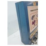 Vintage "Treat-In-A-Box" coin-operated vending machine