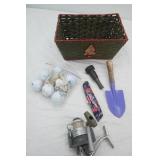 Storage Basket with Golf Balls, Small Garden Scoop, Floral Pattern Utility Knife, Fishing Reel and more