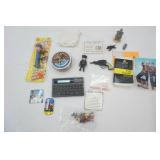 Vintage Collectibles Lot: Police Woman Pez, small toy gun, Word Power Professional, Cowboy Poetry Word Magnets