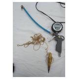 Harley Davidson Battery Tender; Vintage Hand-Crank Drill "egg Beater"; Thorsen 8-in-1 "dog bone" style socket wrench; Vintage Brass Plumb Bob; digital tire pressure gauge and inflator