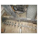 Metal pull behind yard aerator...