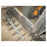 Metal pull behind yard aerator...