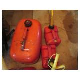 Collection of assorted gas cans wit...