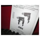 Skil electric drills and red metal ...