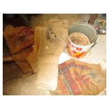 Vintage Tin of gunny sacks and seed...