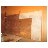 Partial sheets of plywood and a col...