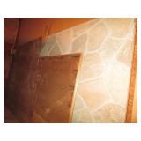 Partial sheets of plywood and a col...