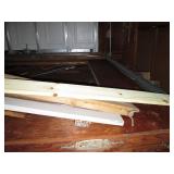 Partial sheets of plywood and a col...