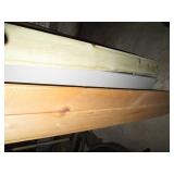 Partial sheets of plywood and a col...