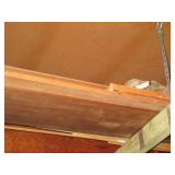 Partial sheets of plywood and a col...