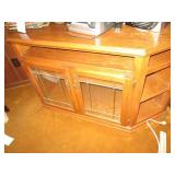 Wood entertainment center with glas...