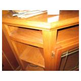 Wood entertainment center with glas...