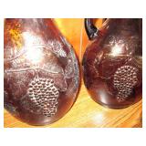 Trio of Amber tone water jugs with ...