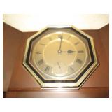 Metal tone Roman numeral wall clock...