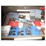 Machinist measuring and cutting too...