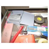 Machinist measuring and cutting too...